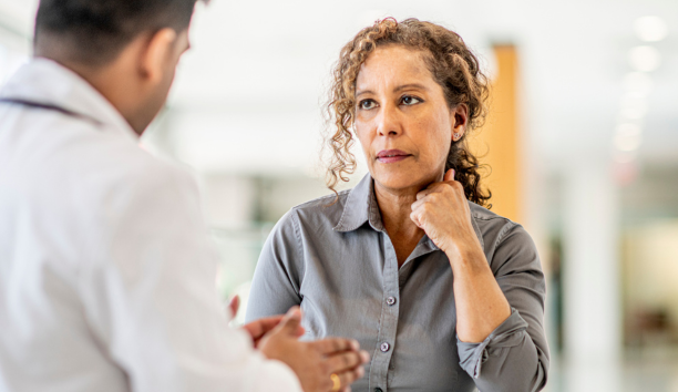 Woman speaks to professional