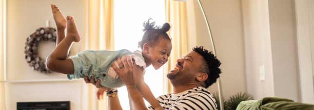 Dad plays with daughter