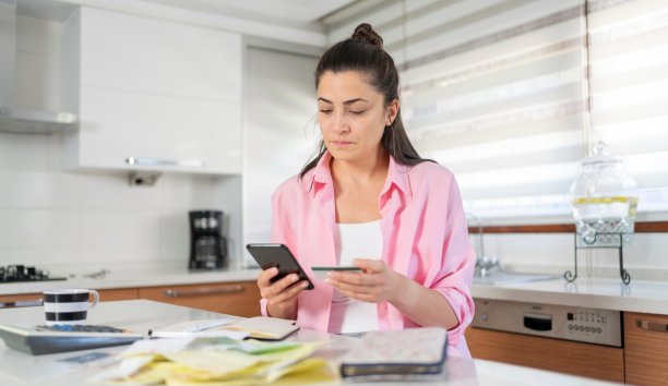 Woman looking at medical bills